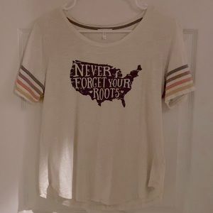 Maurice shirt size medium. Off white in color